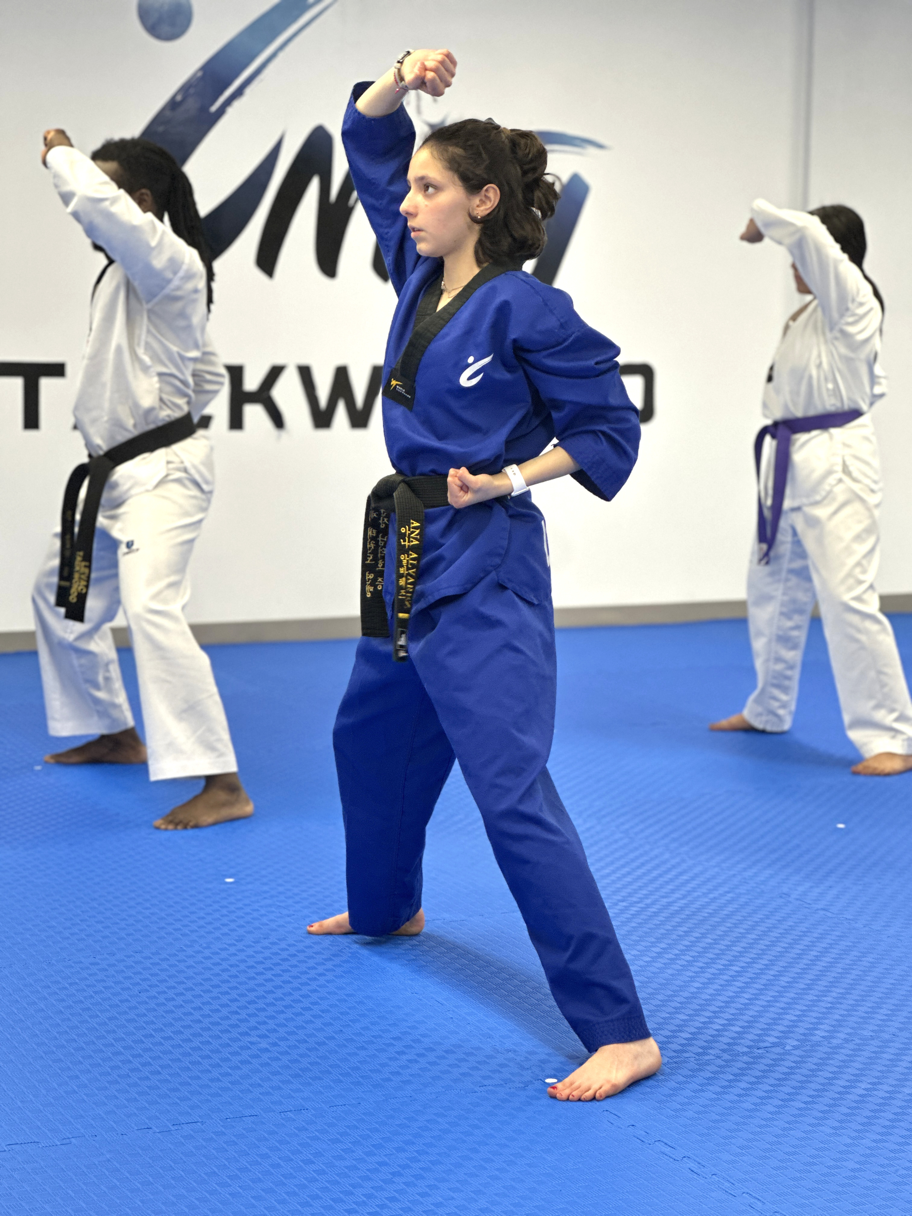 Teen student holding a forms stance during Taekwondo class at Unity Taekwondo Chilliwack