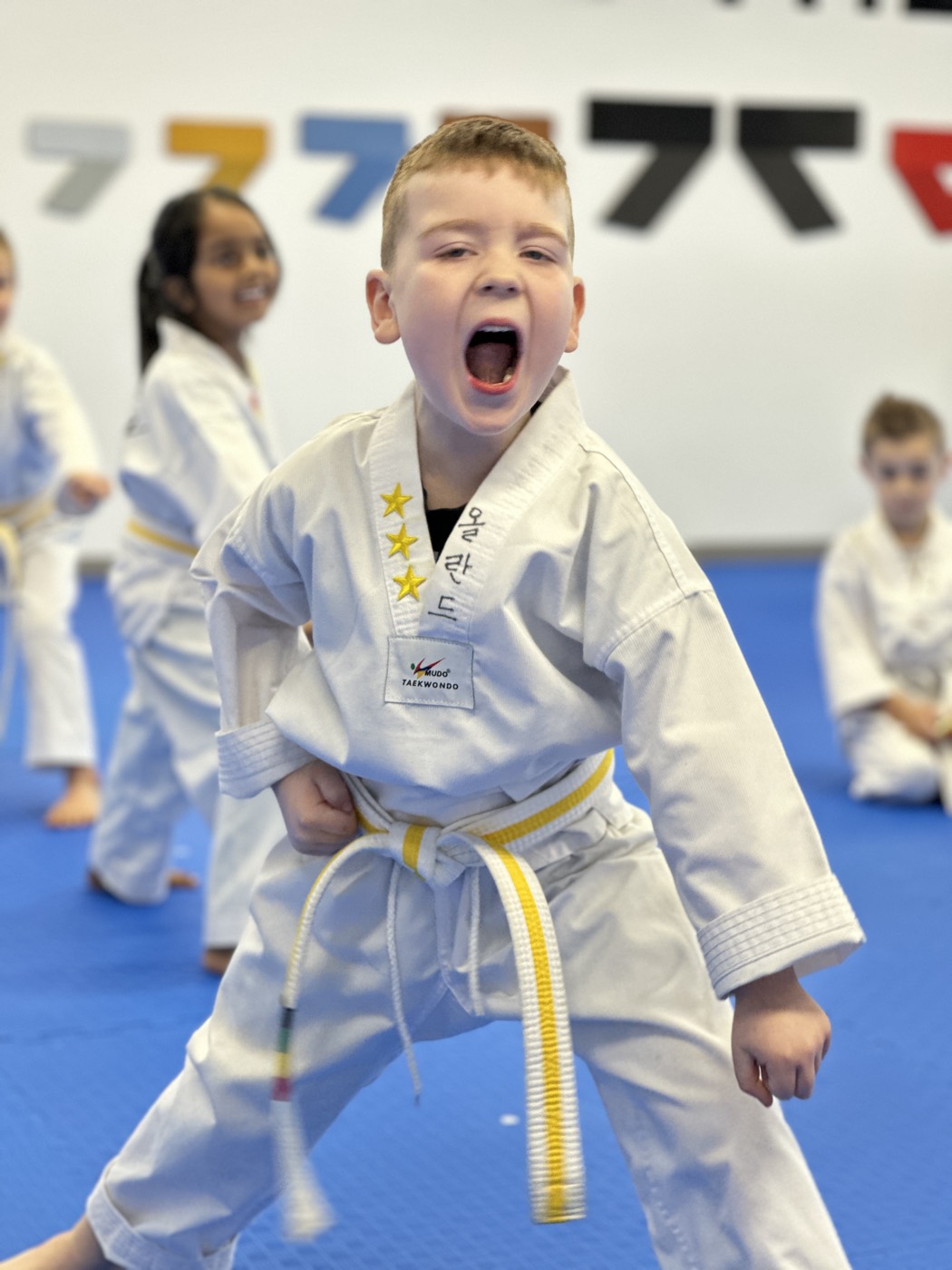 A young Unity Taekwondo student moving through a drill in Chilliwack, BC